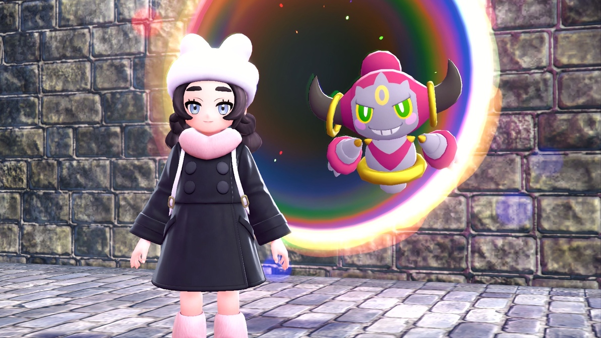 Героиня и Hoopa перед пространственным порталом в Pokémon Legends Z-A Mega Dimension